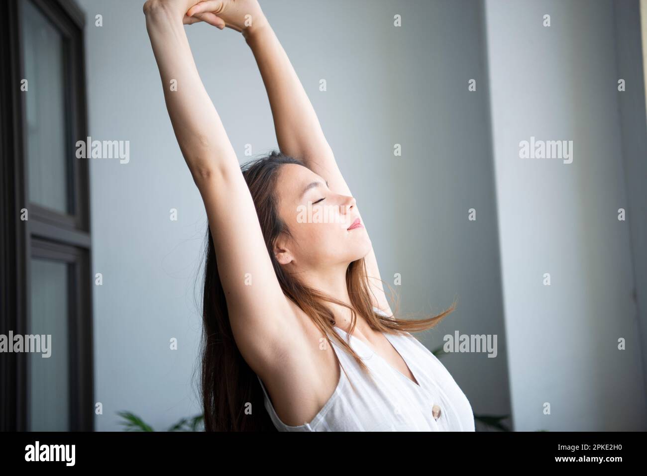 Donna stretching Foto Stock