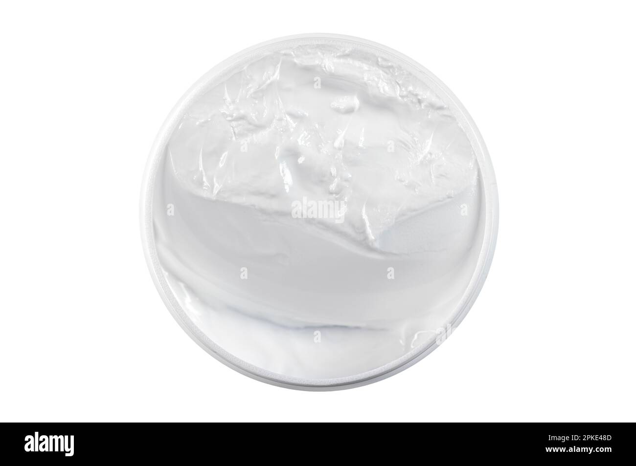 Vasetto, contenitore con crema cosmetica universale bianca per viso, corpo con superficie bianca isolata su bianco, vista dall'alto Foto Stock