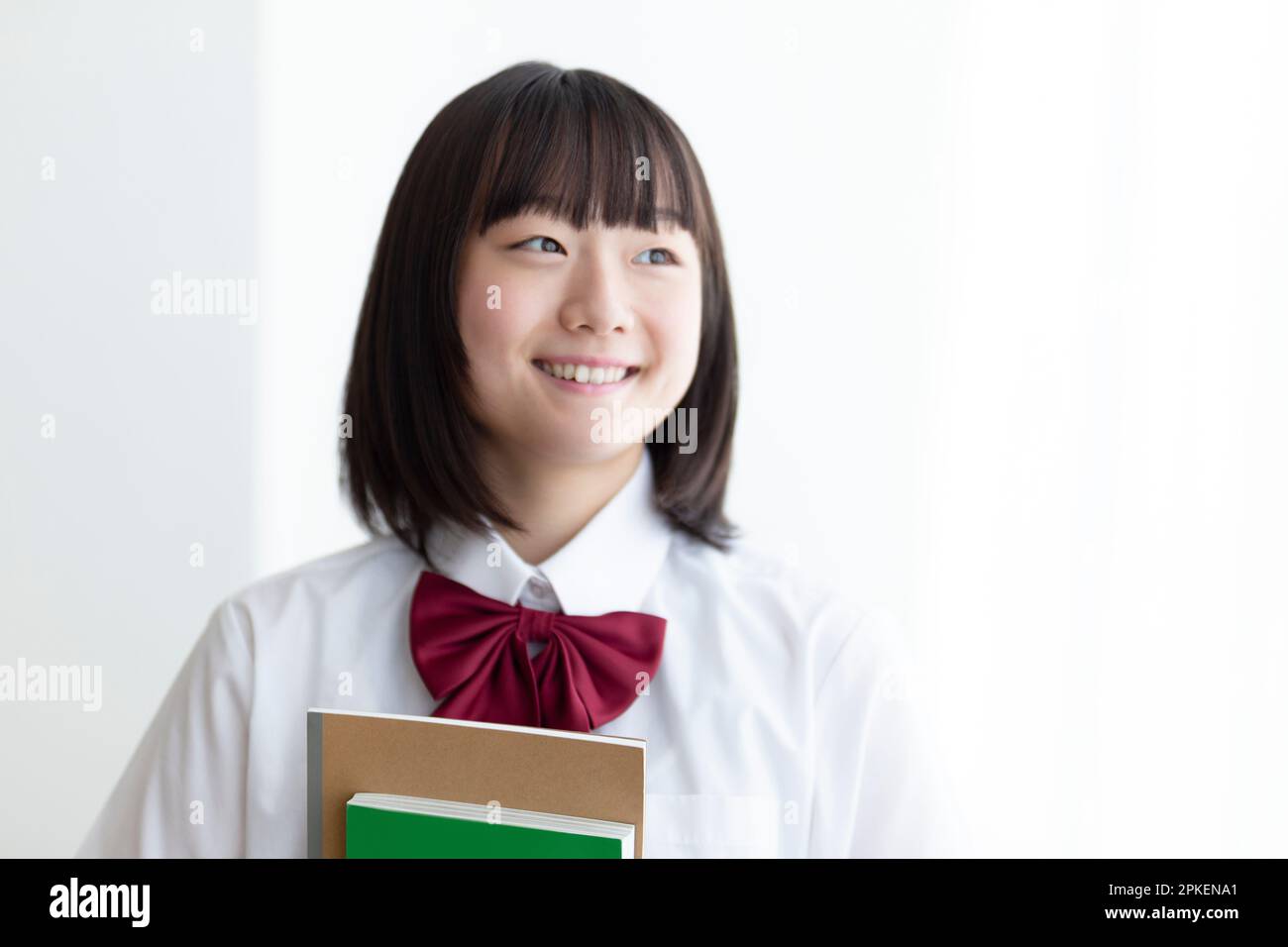 Ritratto di una ragazza della High School in piedi nella classe Foto Stock