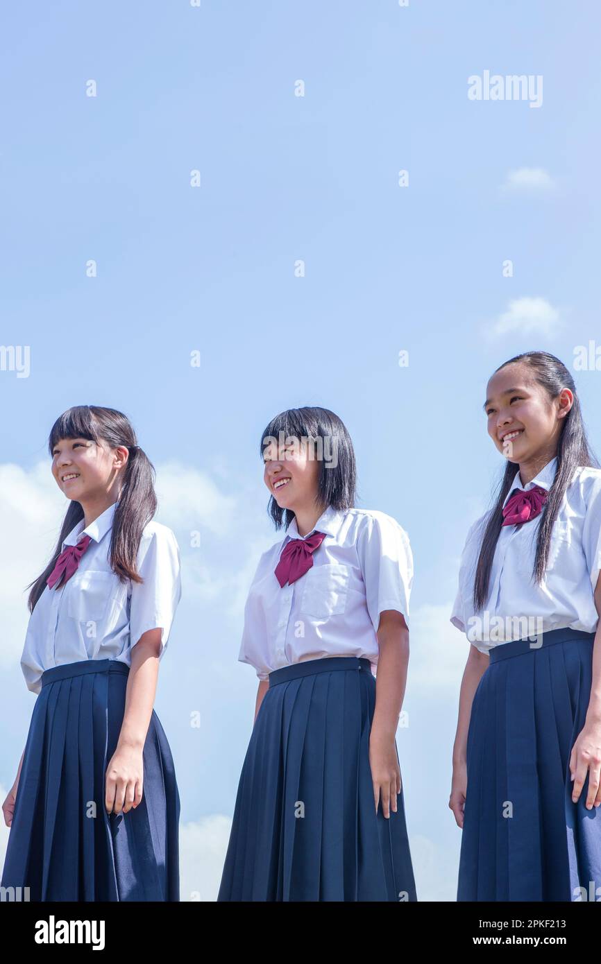 Studenti delle scuole superiori in piedi in banca Foto Stock
