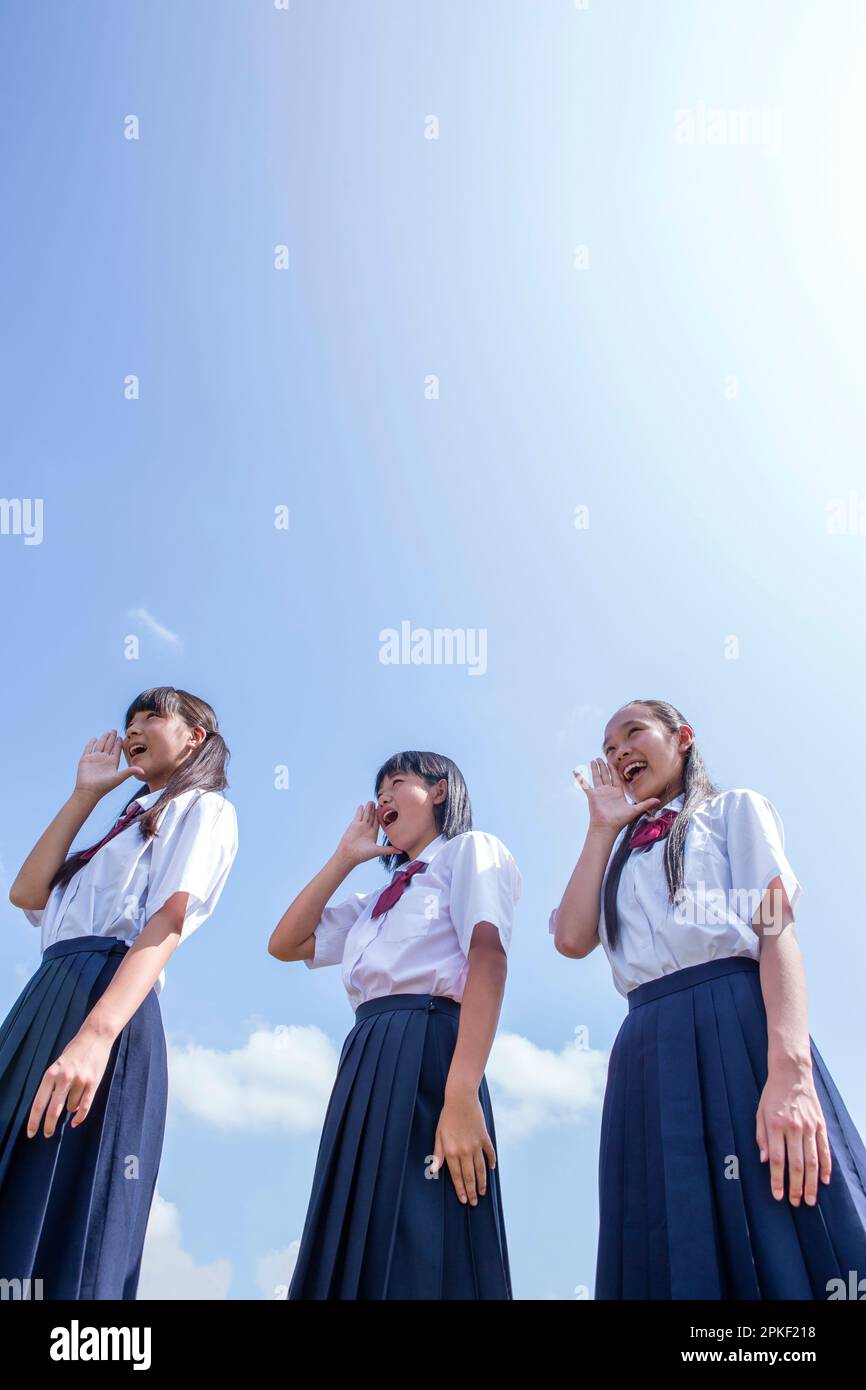 Studenti delle scuole superiori in piedi in banca Foto Stock