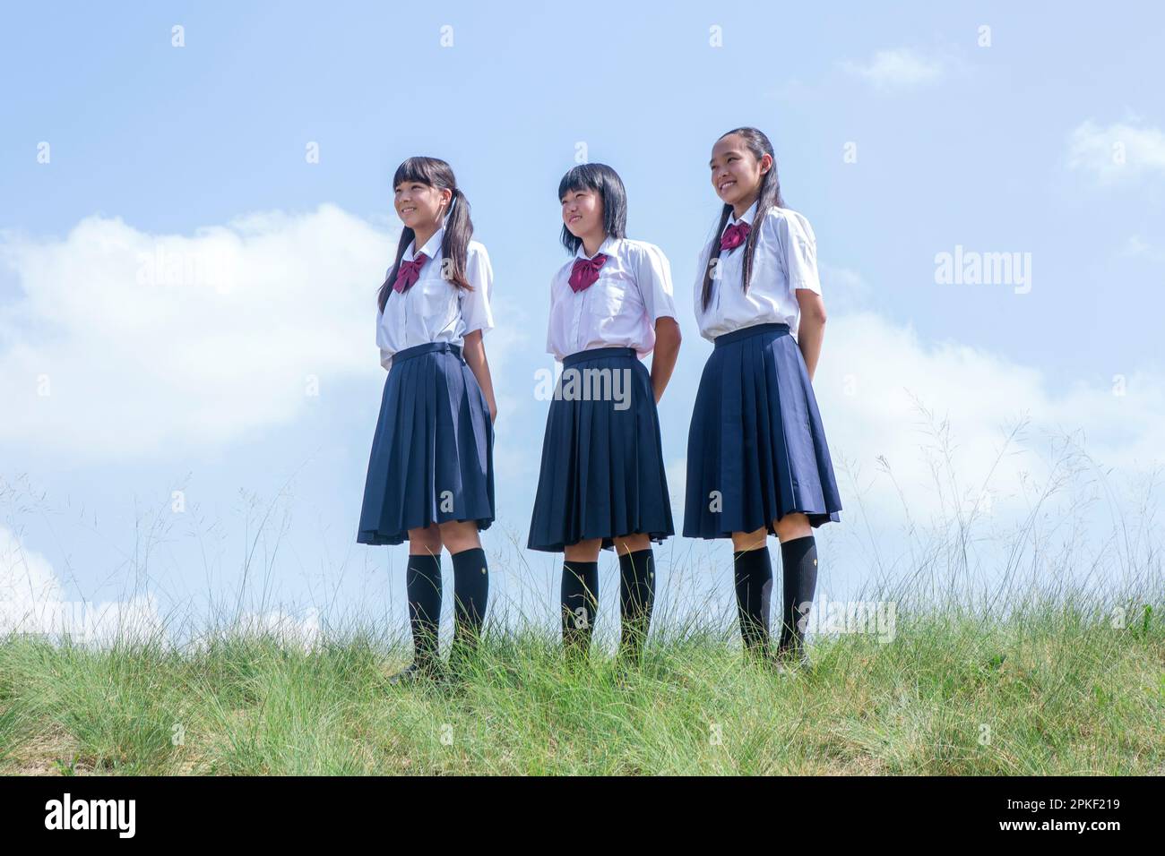Studenti delle scuole superiori in piedi in banca Foto Stock