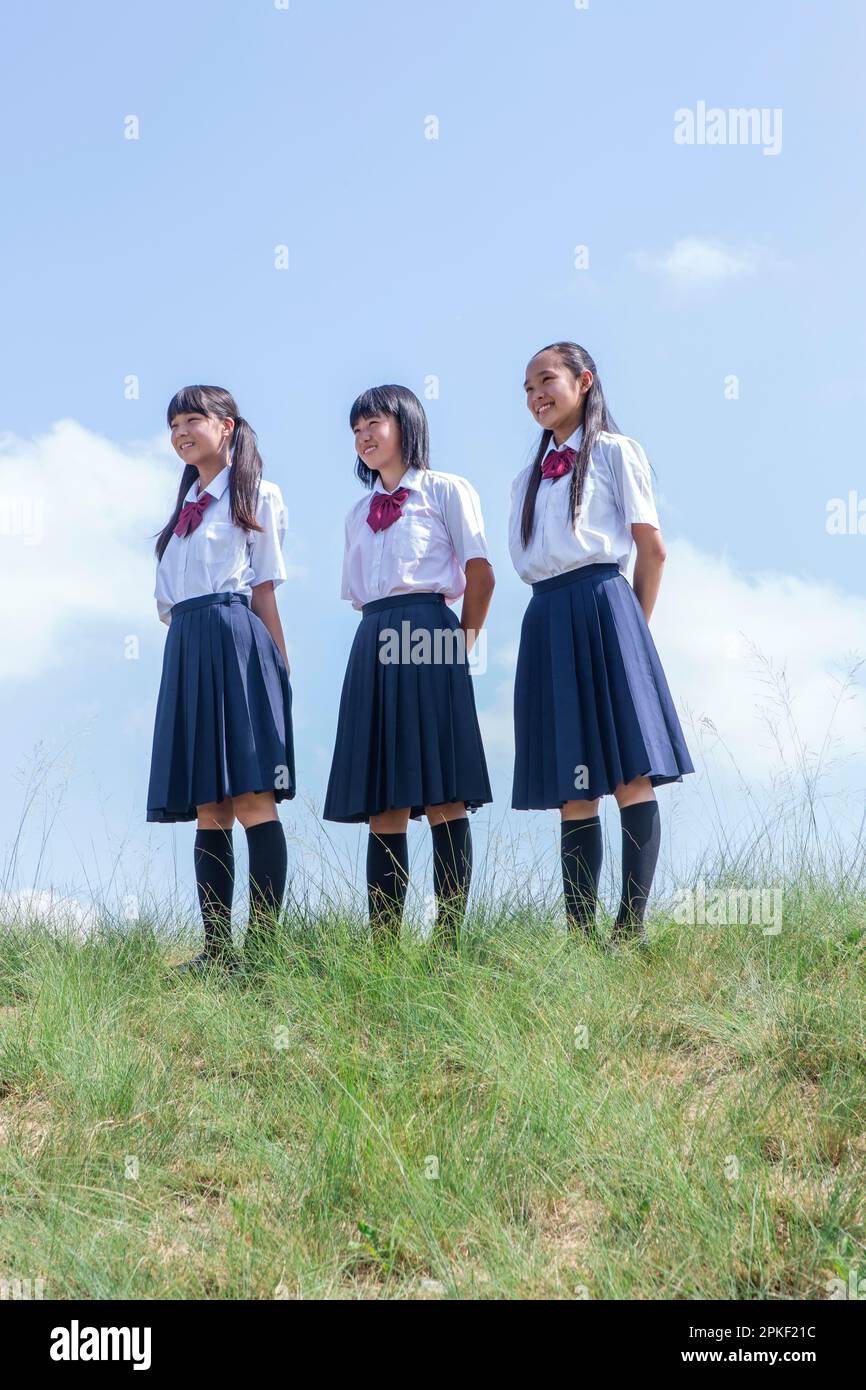 Studenti delle scuole superiori in piedi in banca Foto Stock