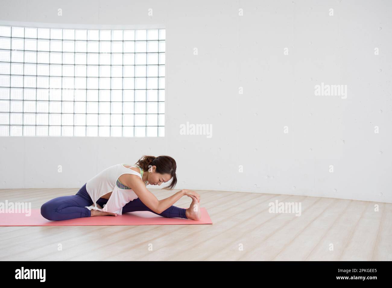 Donna Stretching Foto Stock