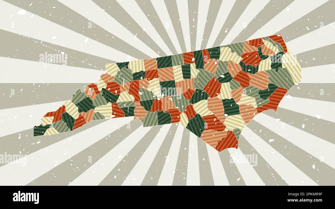 Mappa d'epoca del North Carolina. Poster grunge con mappa dello stato degli Stati Uniti nella tavolozza dei colori rétro. Forma del North Carolina con sfondo a raggi solari. Illustrazione Vettoriale