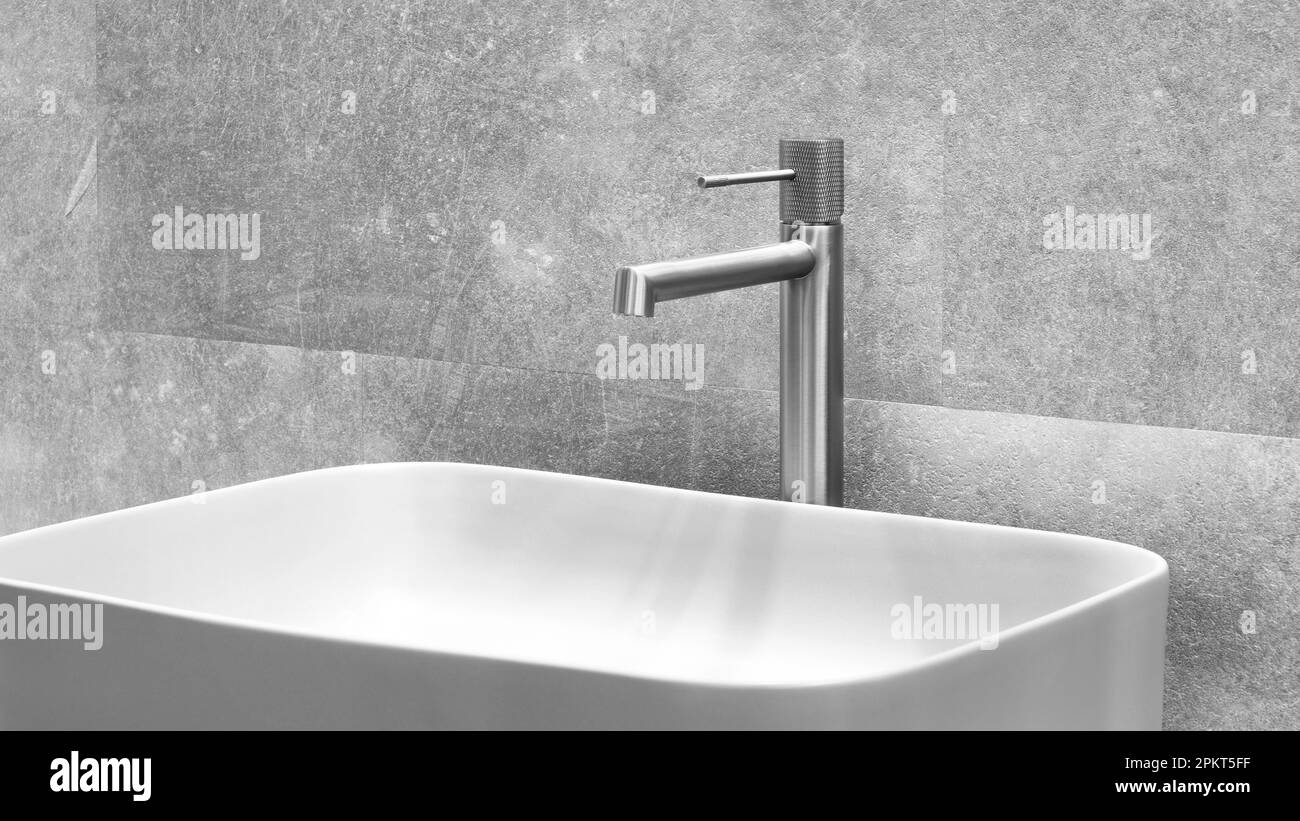 Lavabo con rubinetto in bagno moderno minimalista, interno bagno grigio Foto Stock