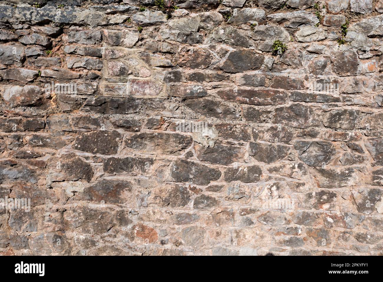 Vecchio muro di pietra inglese texture. Foto Stock