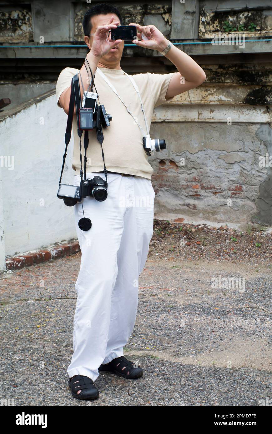 Guida turistica scattare foto di turisti in gruppo Foto Stock