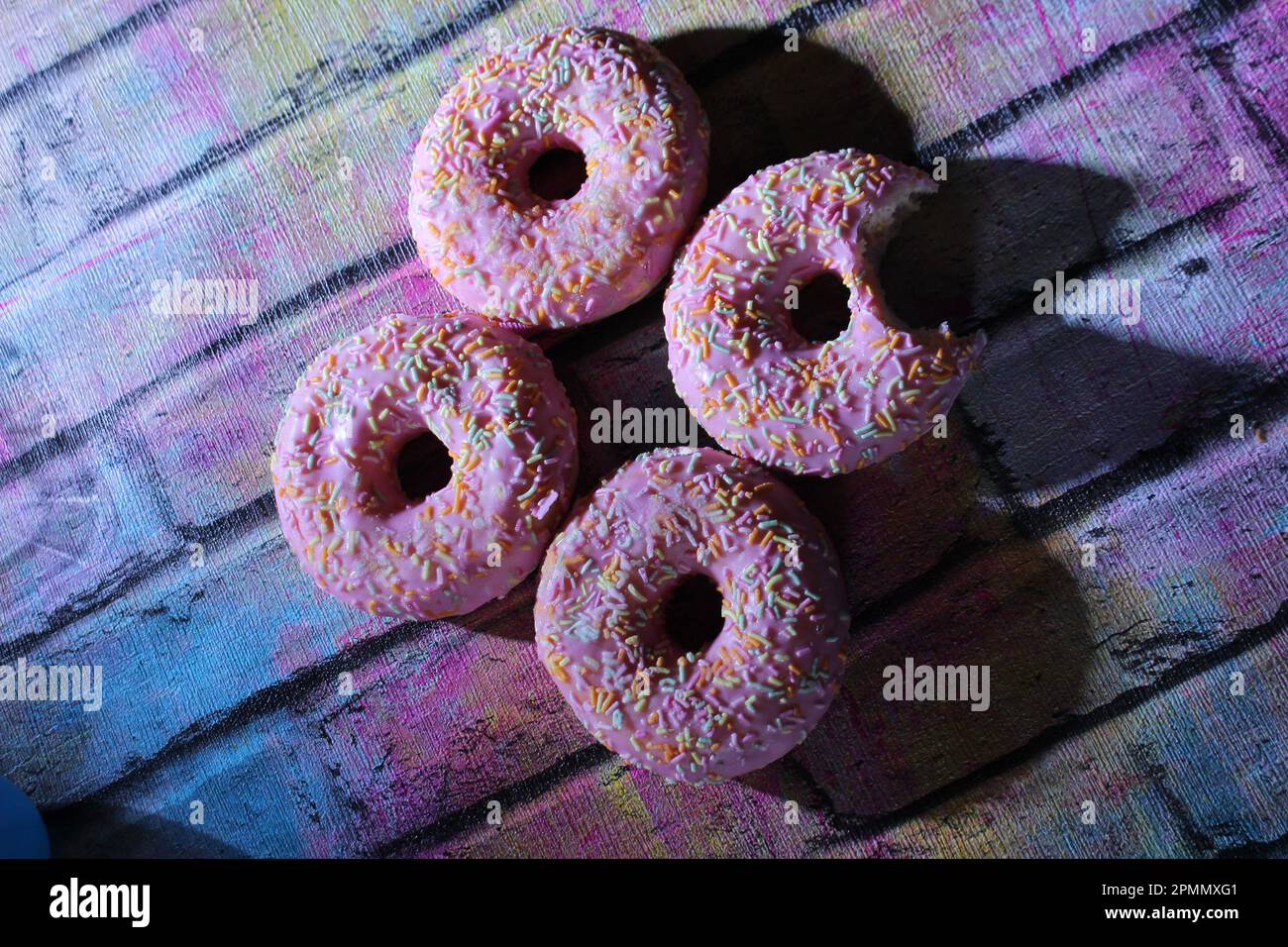 Rosa Donut, Fotografia alimentare Foto Stock