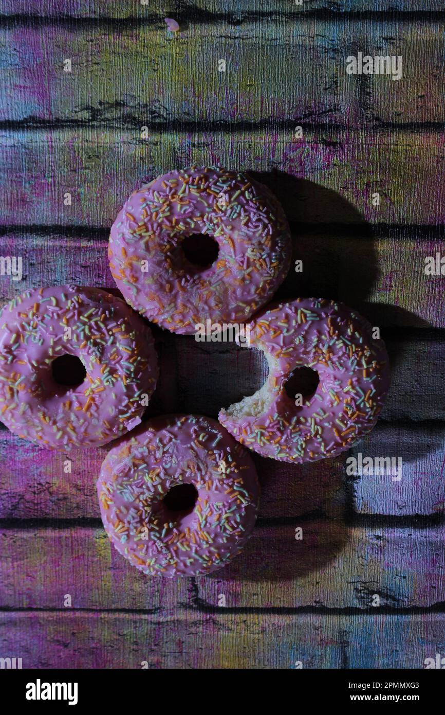 Rosa Donut, Fotografia alimentare Foto Stock
