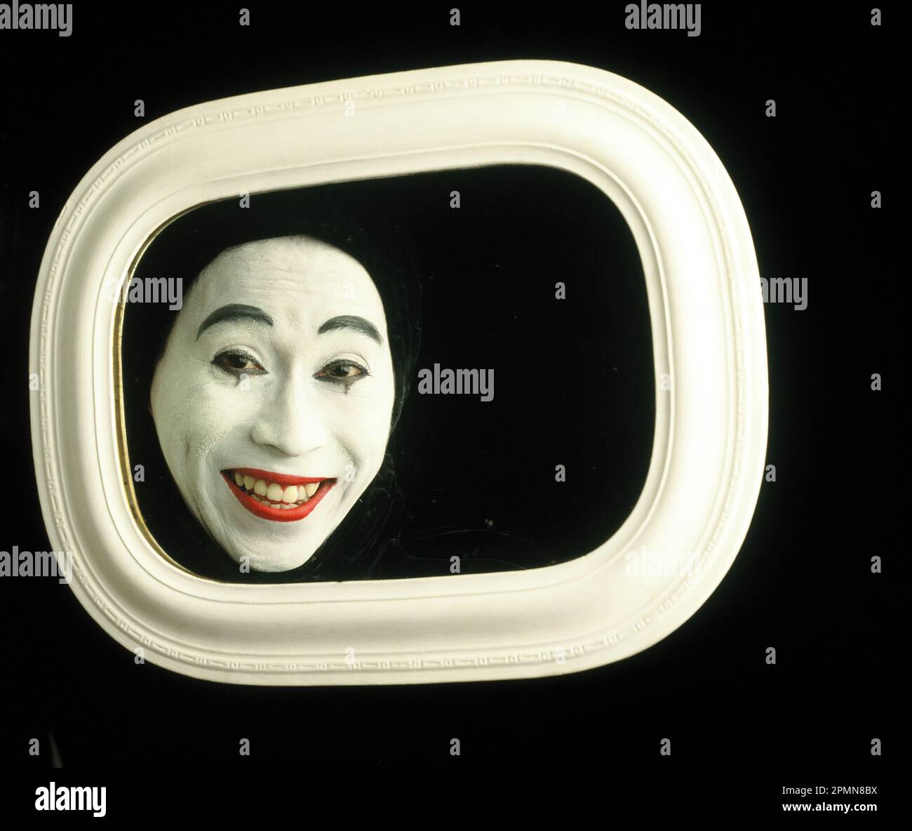 Singapore. Cultura cinese. Carattere tradizionale dell'Opera. Il volto dell'uomo. Foto Stock