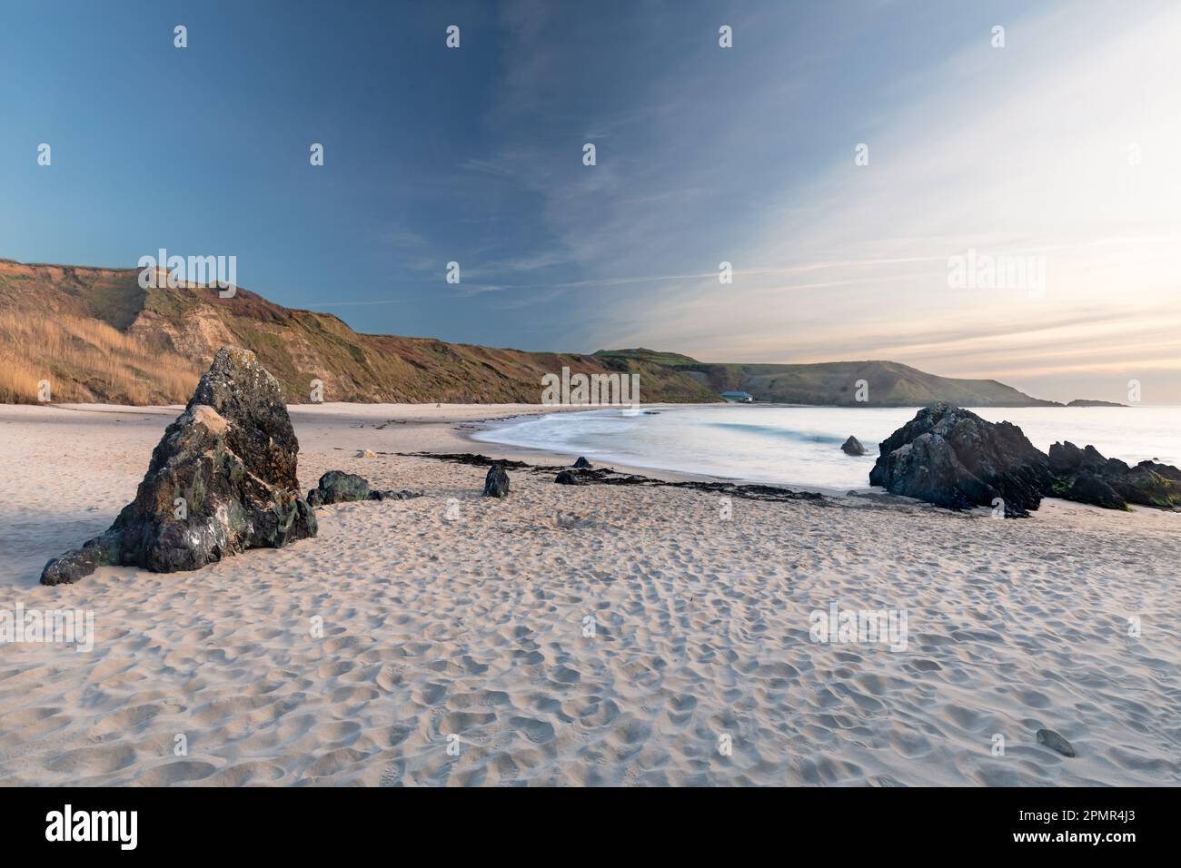 Porthor (spiaggianti sabbie) spiaggia e baia, Llyn Peninusla, Galles Foto Stock