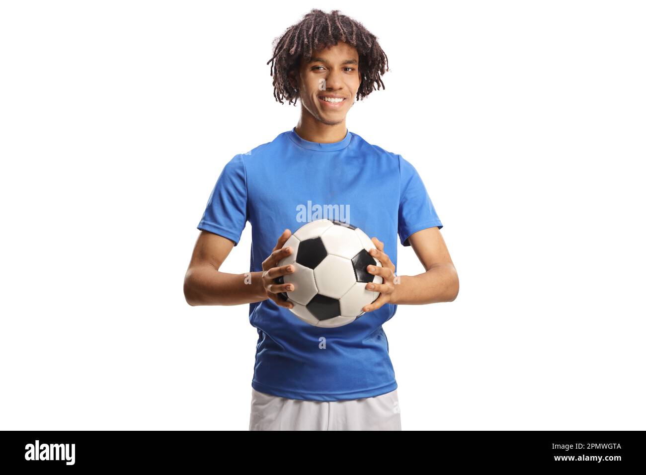 Giocatore di calcio afro-americano che tiene una palla isolata su sfondo bianco Foto Stock