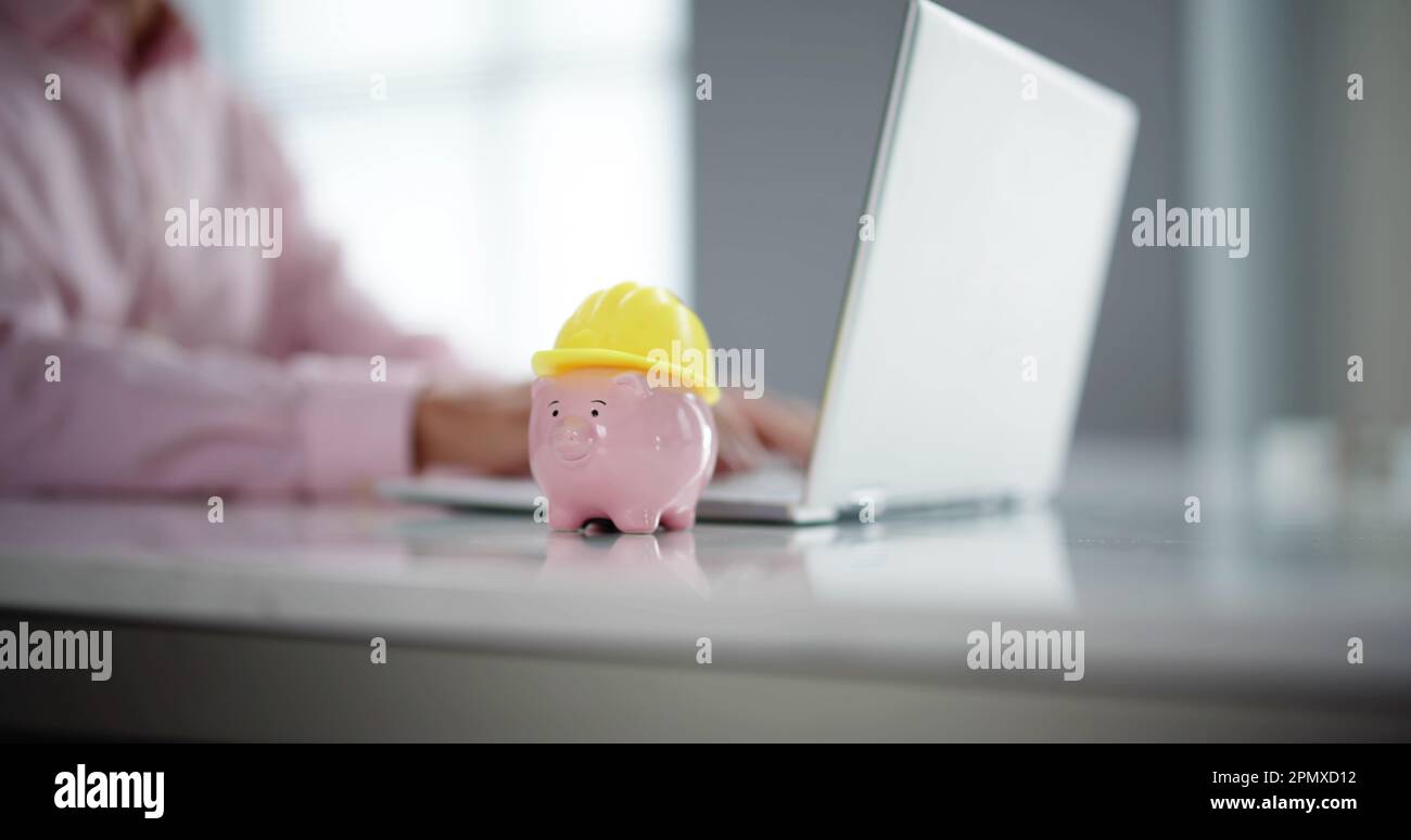 Ragioniere che fa il risparmio di denaro e la sicurezza della costruzione Foto Stock