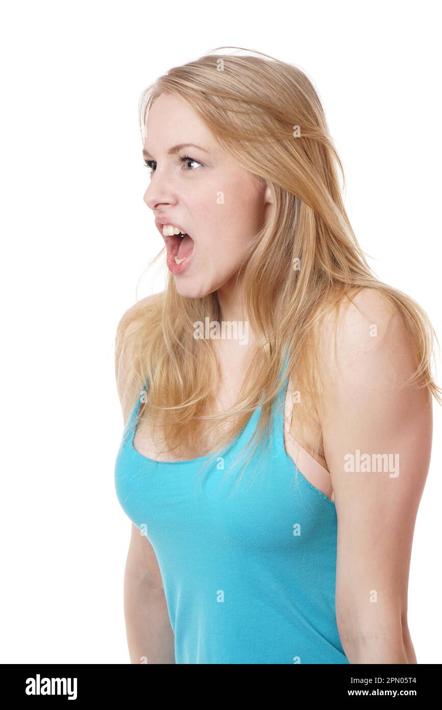 Vista laterale giovane donna urlare o gridare Foto Stock