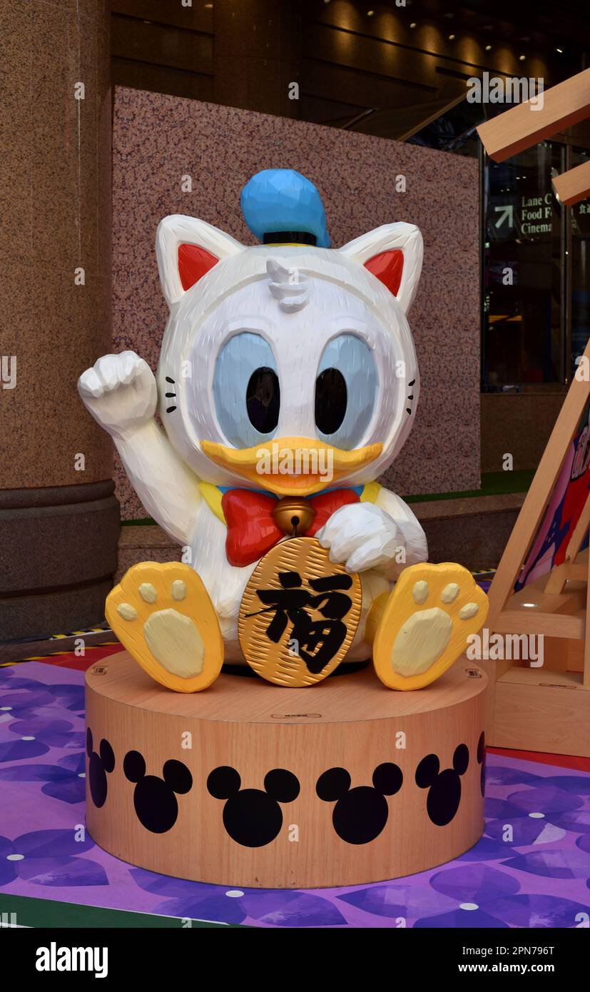 Donald anatra come beckoning gatto Foto Stock