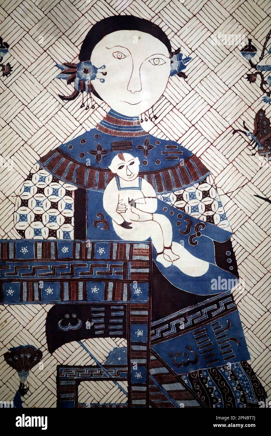 Museo delle Civizzazioni Asiatiche. Bay carrier con immagine di una madre e di un bambino. Immagine della dea Mpther. JVA, 1910. Cotone. Singapore. Foto Stock