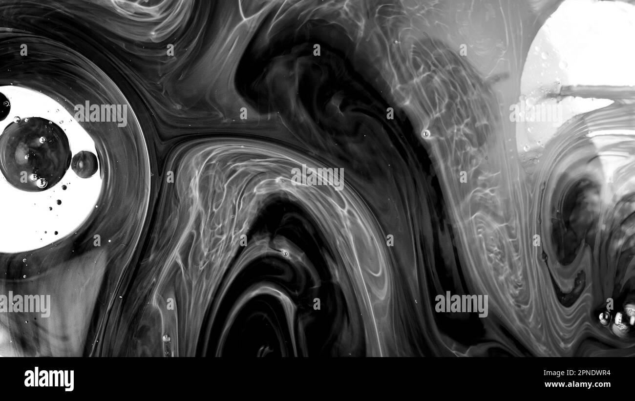 Macrofotografia con miscela di olio/acqua/ferrofluido. Ripresa su Sony a7sii con un obiettivo macro Sigma da 70 mm. Foto Stock