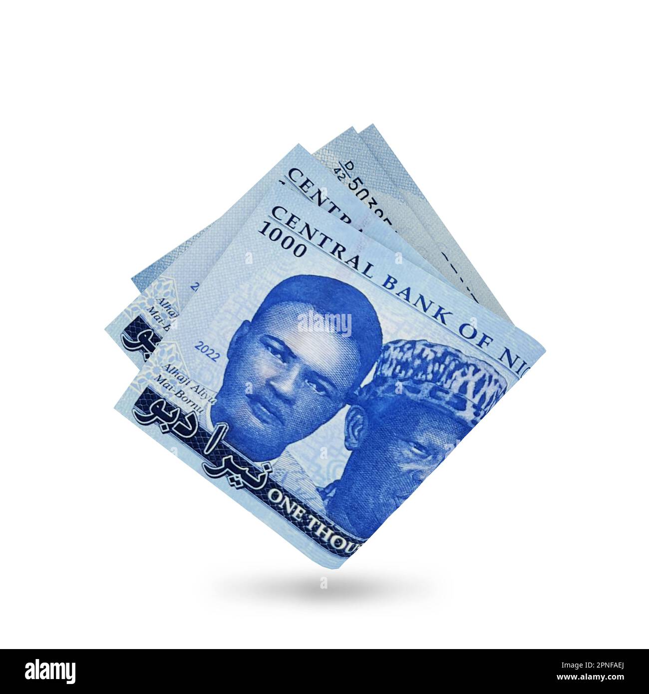 3D rendering di note nigeriane di Naira ripiegate isolate su sfondo bianco. Foto Stock