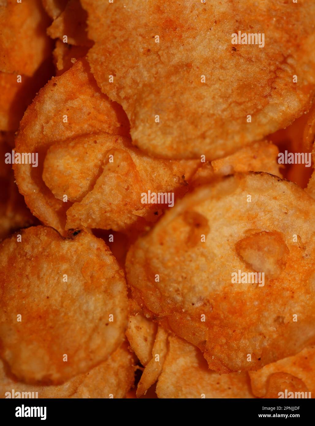 Vista dall'alto di patatine fritte con paprika spezia fast food concetto mangiare cibo spazzatura sfondo alta qualità grande stampa istantanea stock fotografia Foto Stock