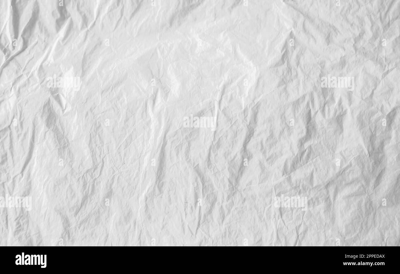 Sfondo a grana bianca. Carta bianca vecchia sgualcita e stropicciata sfondo astratto. Superficie grunge carta materiale per pagina Foto Stock