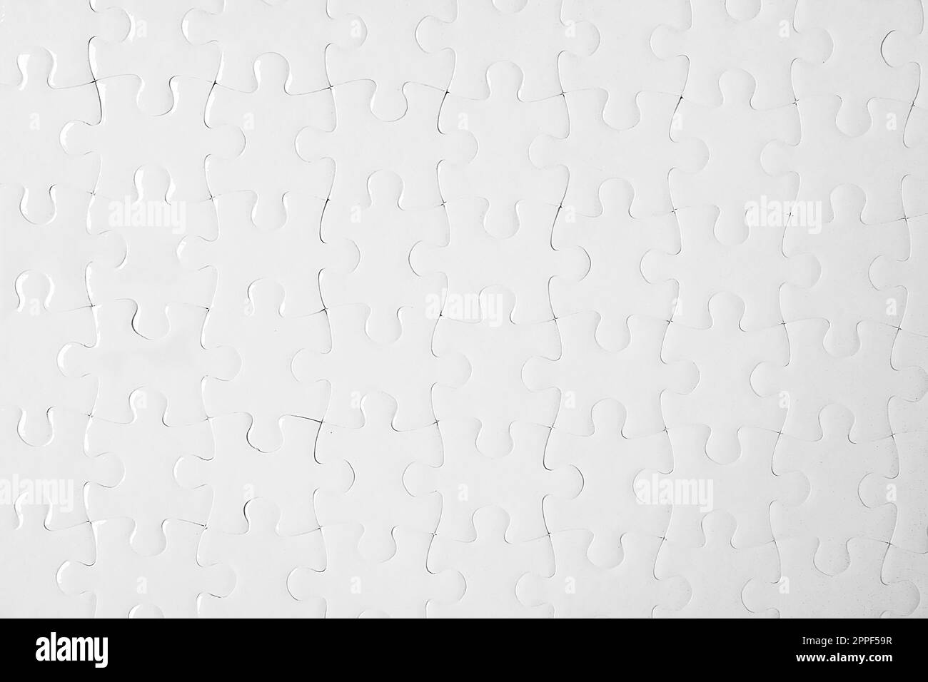 Bianco puzzle come sfondo, vista dall'alto Foto Stock