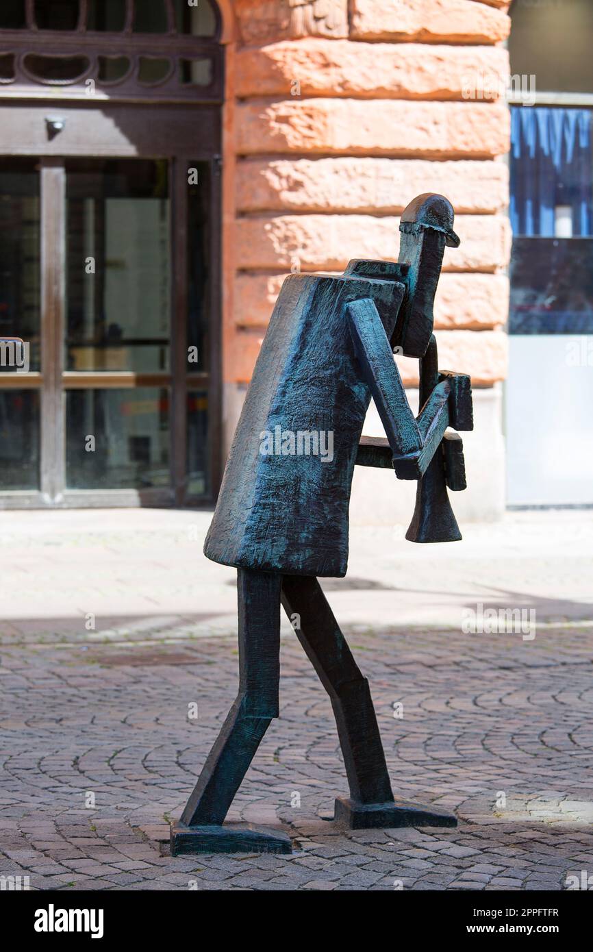 Orchestra ottimista, attraente scultura in strada presso la piazza del mercato di Stortorget, Malmo, Svezia Foto Stock