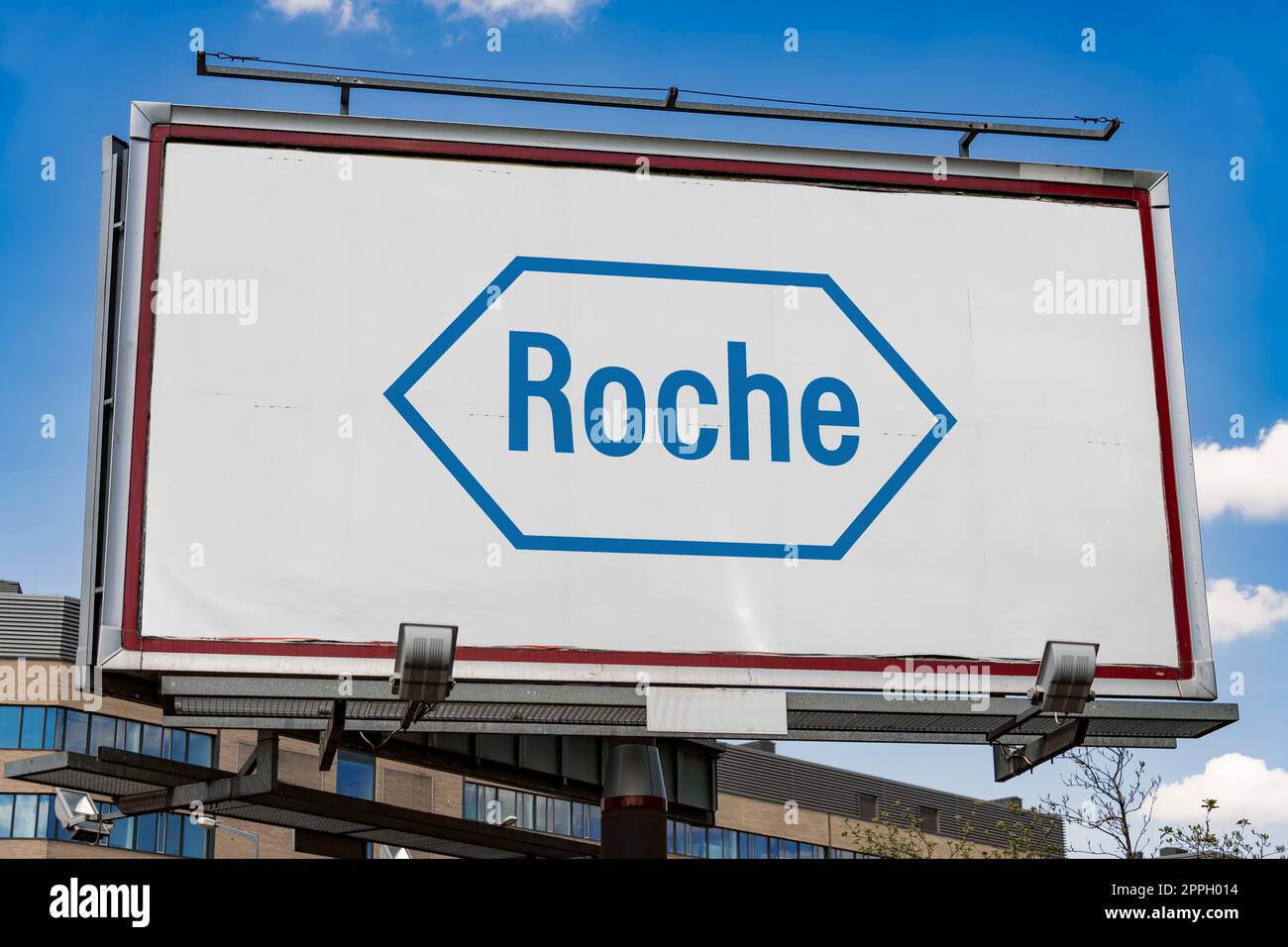 Cartellone pubblicitario con logo di Roche Foto Stock