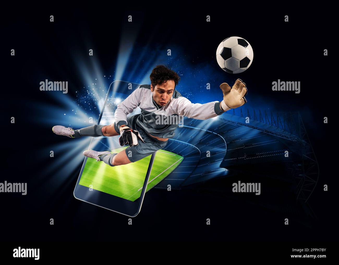 Guarda un evento sportivo dal vivo sul tuo dispositivo mobile. Scommesse sulle partite di calcio Foto Stock