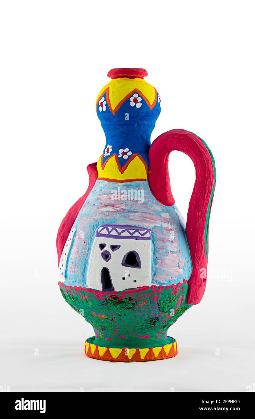 Caraffa in ceramica decorata con colori artistici e dipinti in stile nubiano con un solo manico Foto Stock