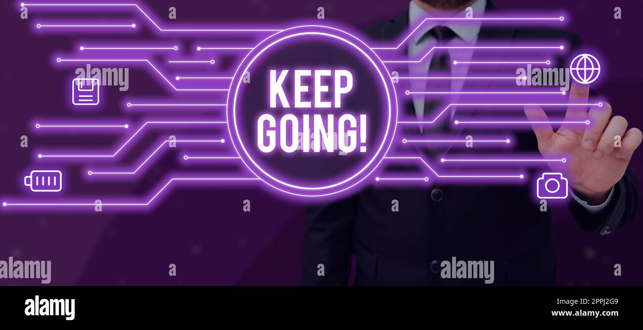 Segno di scrittura della mano continua ad andare. Approccio aziendale per continuare a vivere normalmente nonostante la situazione attuale Foto Stock