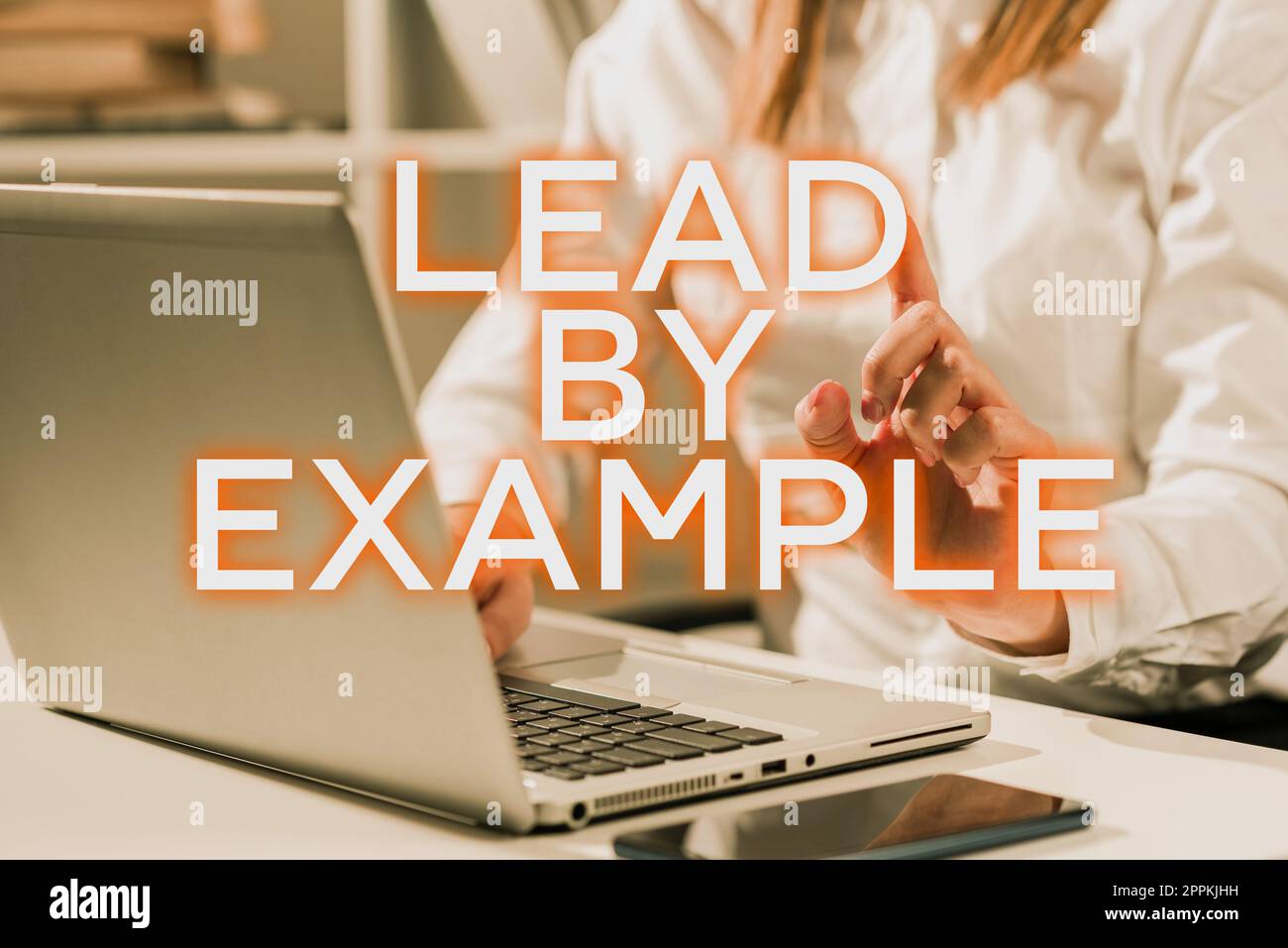 Scrittura del testo visualizzazione Lead by example (derivazione per esempio). Parola per essere un leader mentore seguire le regole dare esempi Coach Foto Stock