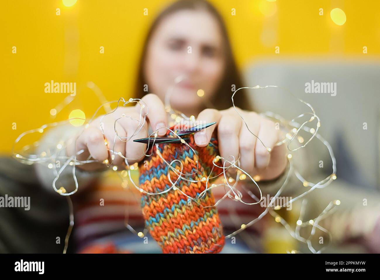 Primo piano maglia e luci concetto foto Foto Stock