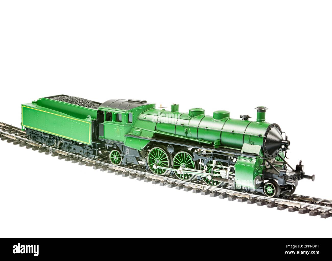 Isolato toy train con un motore a vapore locomotiva Foto Stock