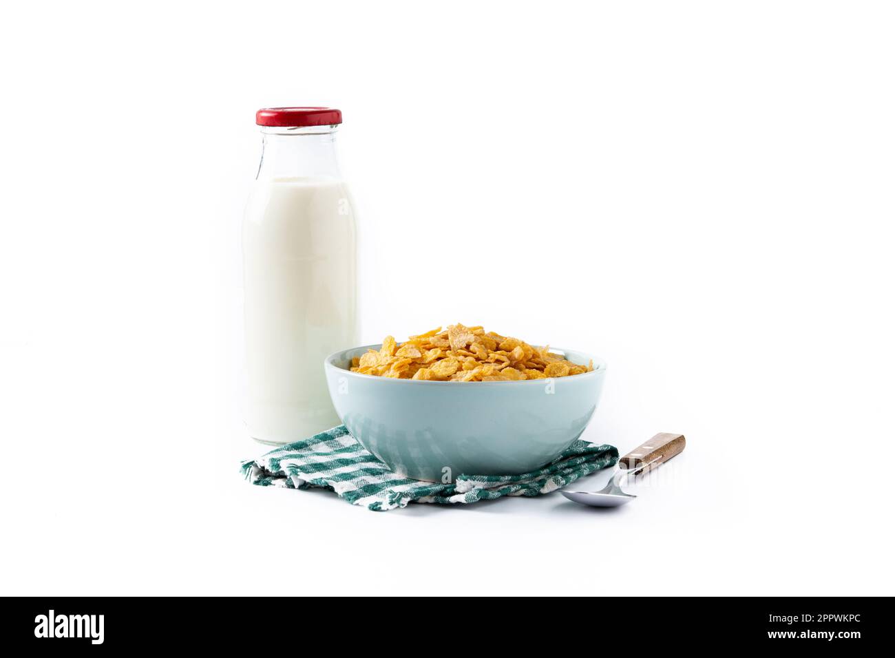 Ciotola con cereali e bottiglia di latte per la colazione Foto Stock