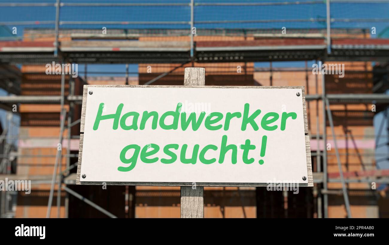Cartello di fronte alla costruzione della conchiglia con l'iscrizione tedesca: 'Handwerker gesucht' (Craftsman Wanted) Foto Stock