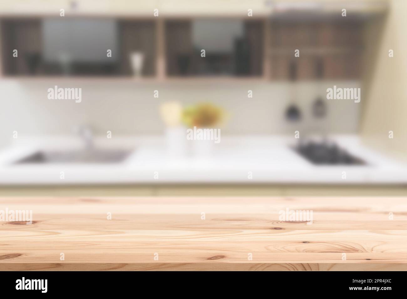 Blur lavello contro spazio in cucina moderna casa con in primo piano in legno per la pubblicità montaggio sfondo Foto Stock
