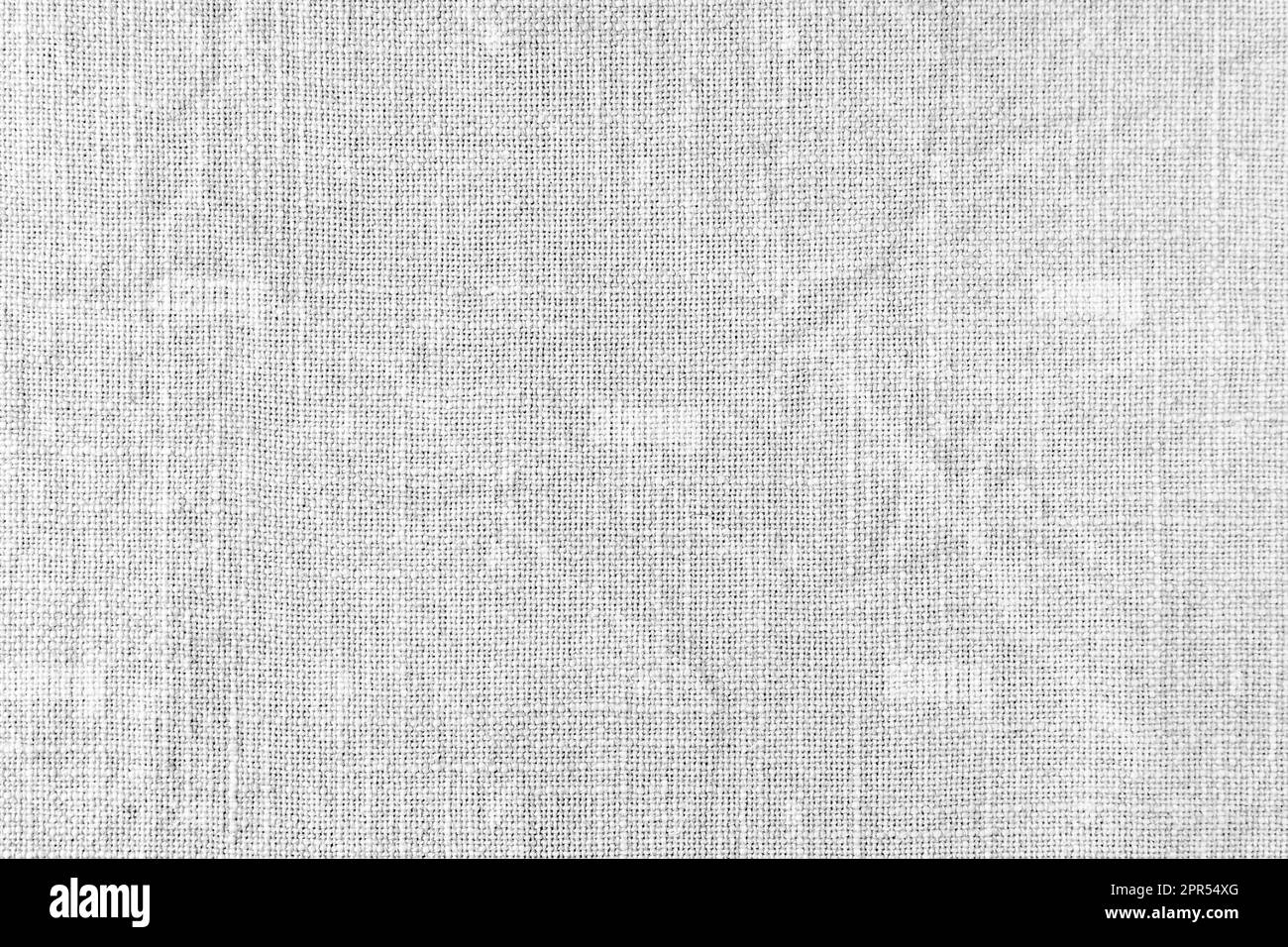 Tessuto di lino naturale bianco sfondo texture tessuto. Superficie in tessuto di lino, tovaglia, tappezzeria, tende tessili. Vista dall'alto, primo piano Foto Stock