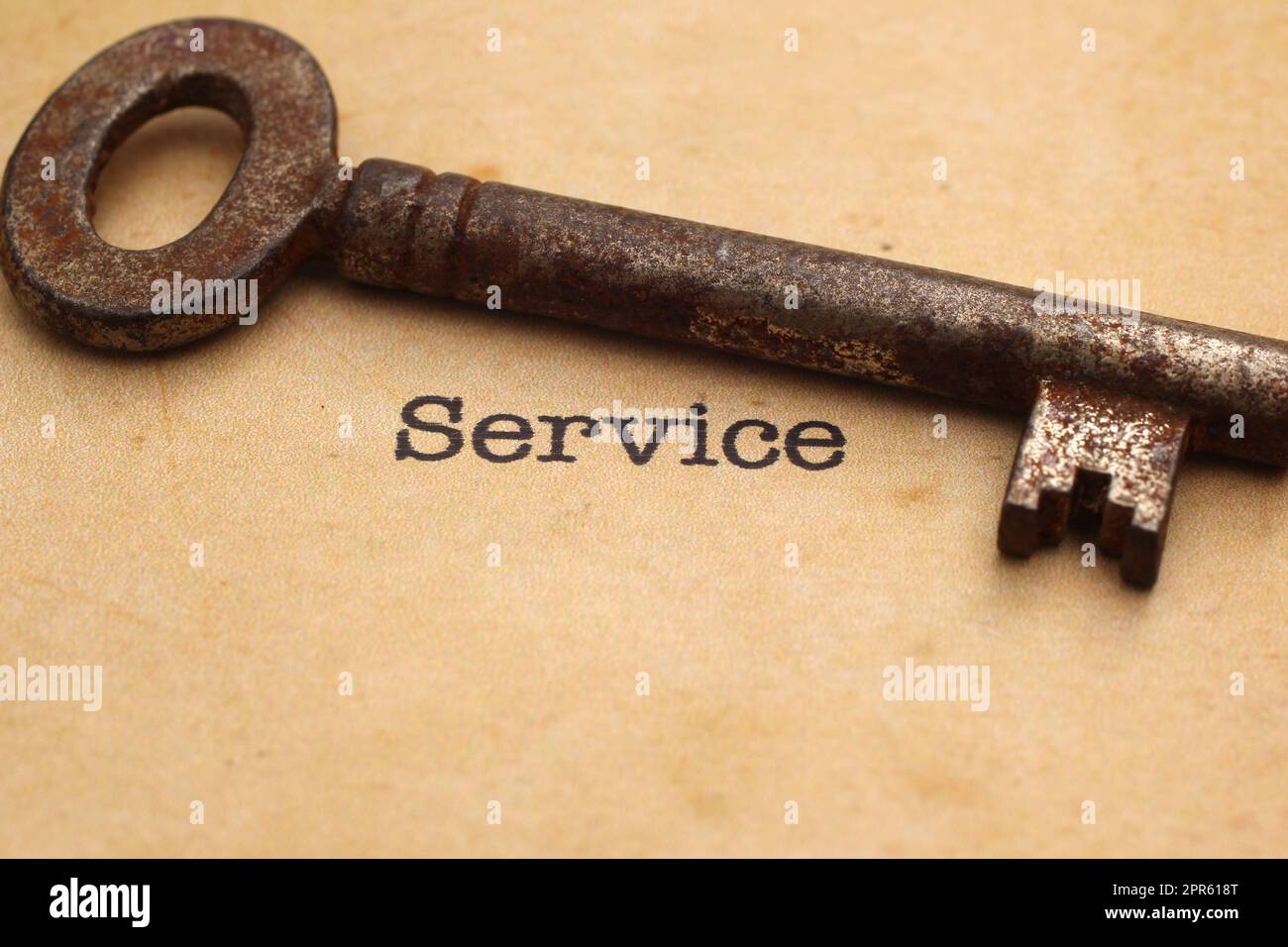 Vecchia chiave sul testo del servizio Foto Stock