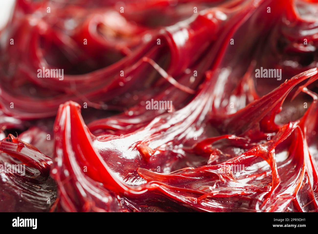 Grasso, rosso eccellente resistenza all'acqua grasso sintetico al litio complesso per percorsi mobili e lubrificazione di macchinari per il settore automobilistico e industriale Foto Stock