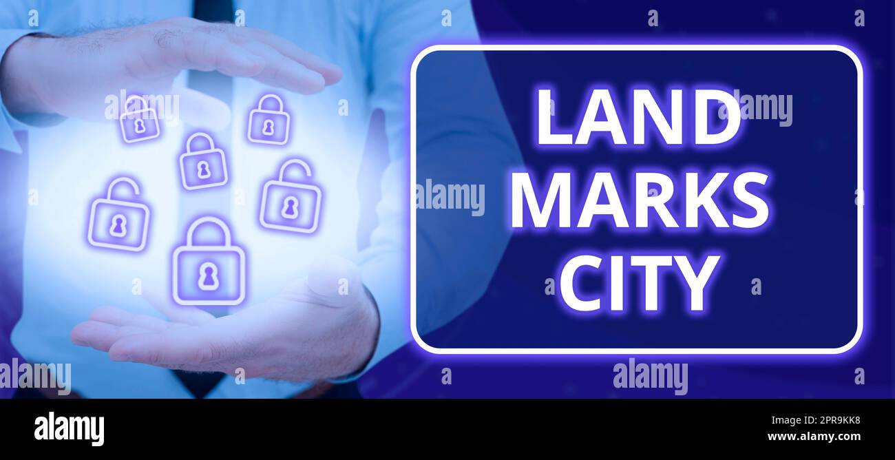 Testo calligrafico Land Marks City. Idea di business architettura importante luoghi nelle città per visitare l'uomo con lucchetti digitali in mano che mostra dati e sicurezza informatica. Foto Stock