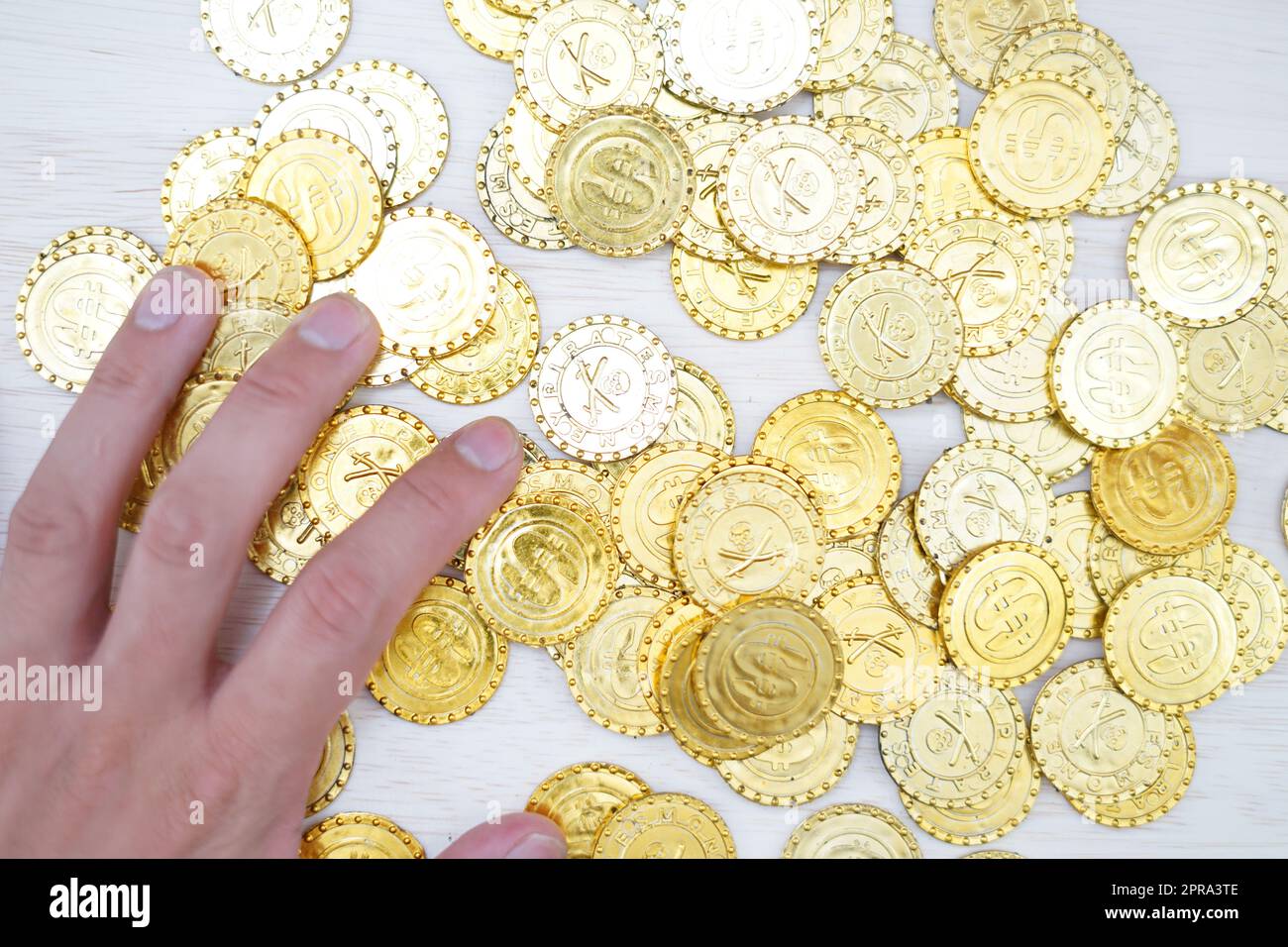 Molte monete d'oro Foto Stock
