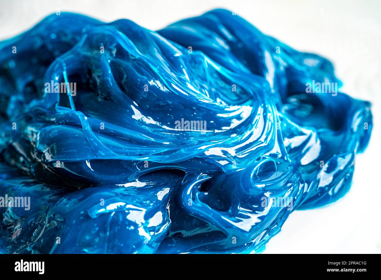Grasso sintetico al litio complesso di alta qualità blu, alte temperature e lubrificazione di macchinari per uso automobilistico e industriale. Foto Stock