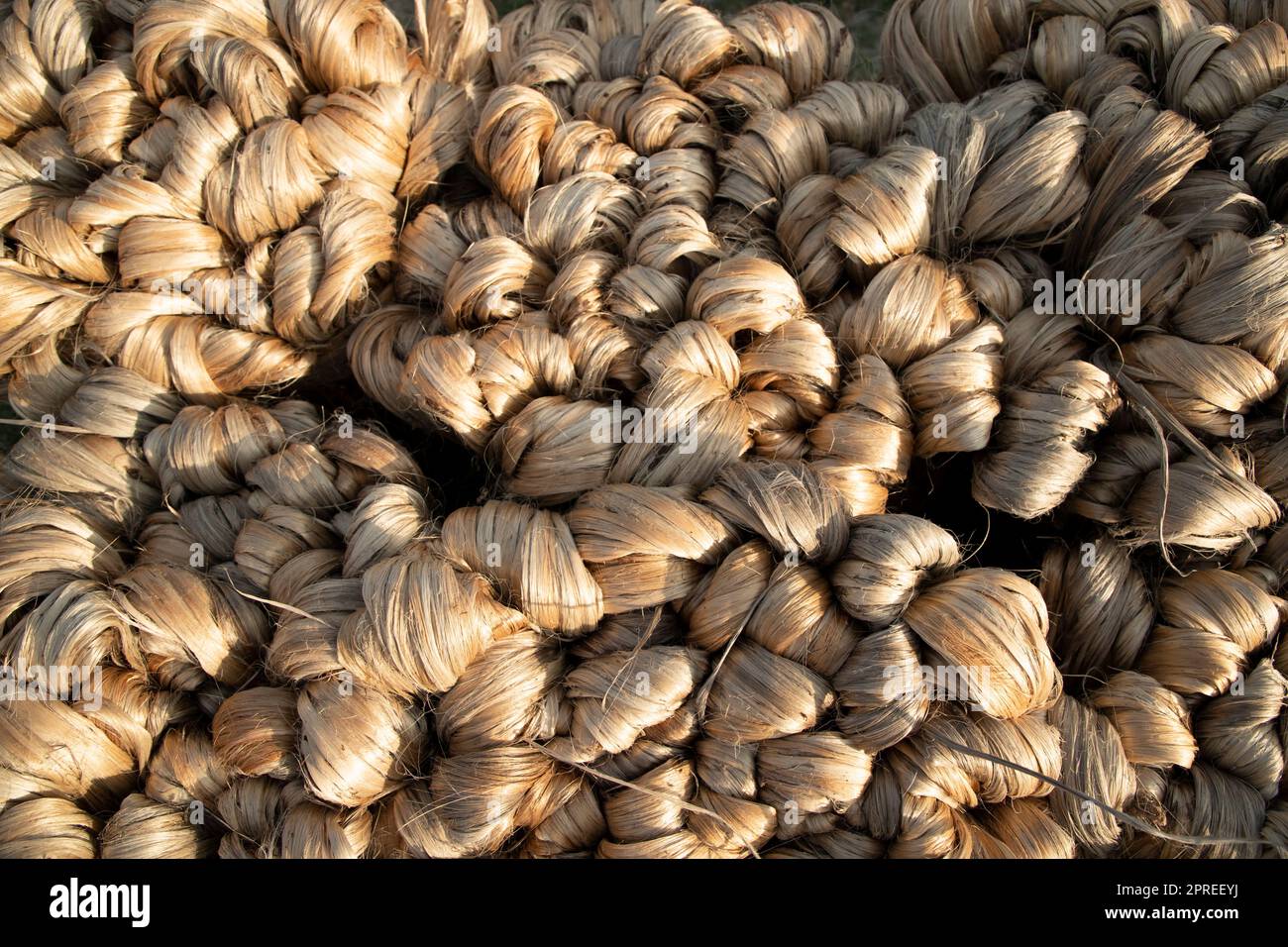 Spesso bruno fascio di fibra di iuta grezza trama sfondo Foto Stock