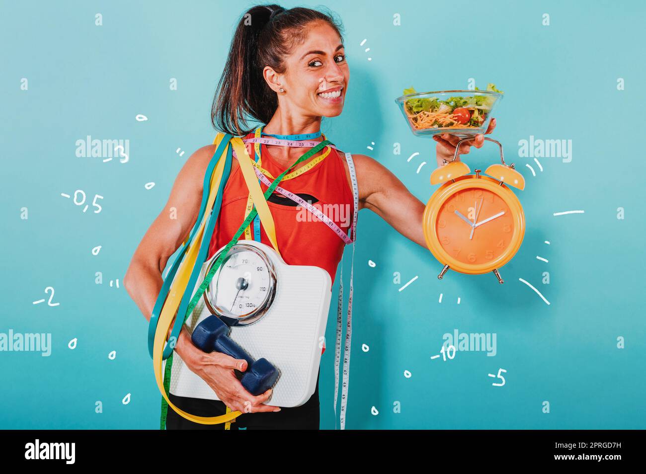 Donna felice segue una dieta e fa palestra Foto Stock