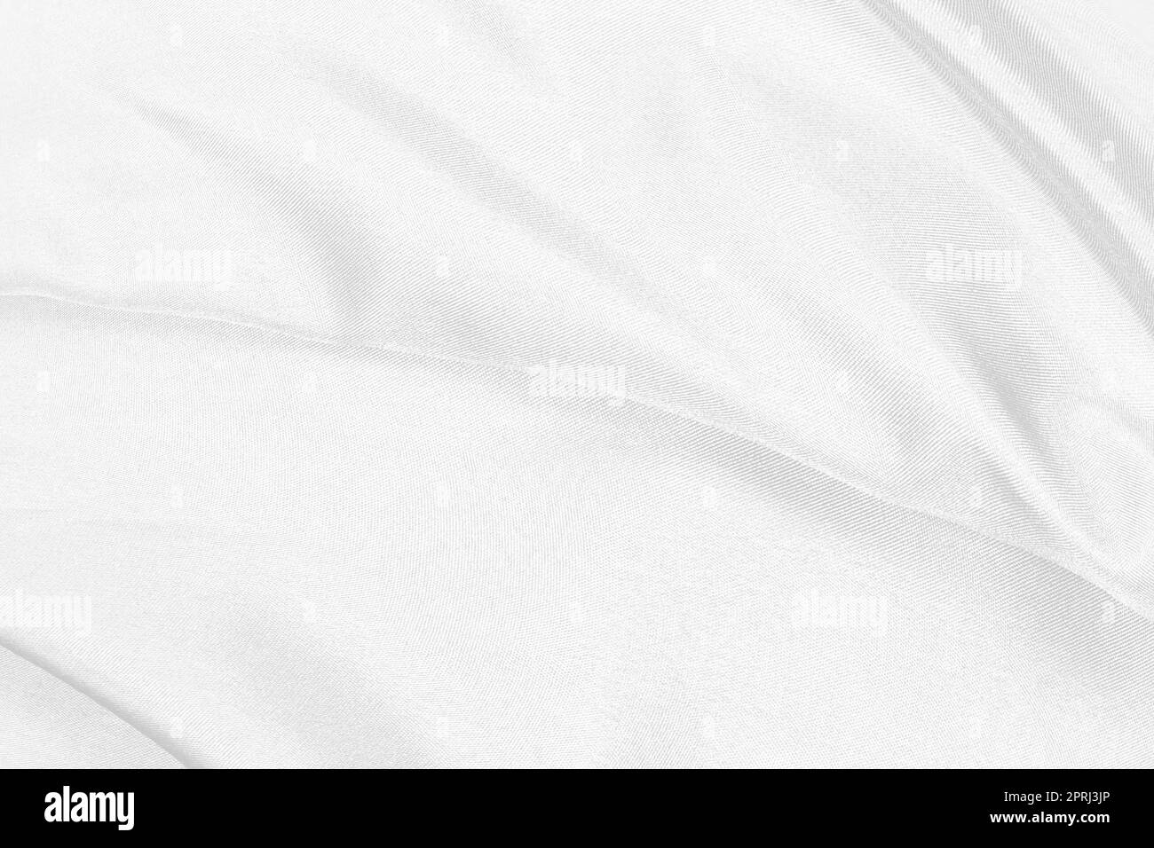 Elegante tessuto di seta bianca liscio o tessuto di lusso satinato può essere utilizzato come sfondo di nozze. Per drappeggi lussuoso design astratto Foto Stock