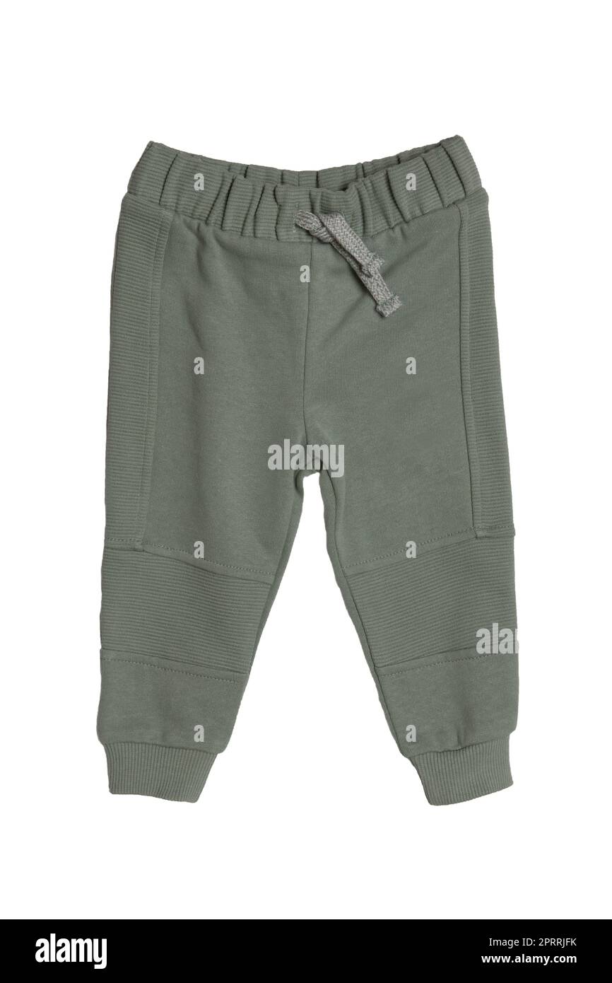 Abbigliamento sportivo per bambini. Primo piano di un bambino verde sport pantaloni felpa isolato su sfondo bianco. Pantaloni moda primavera e autunno per bambini. Foto Stock