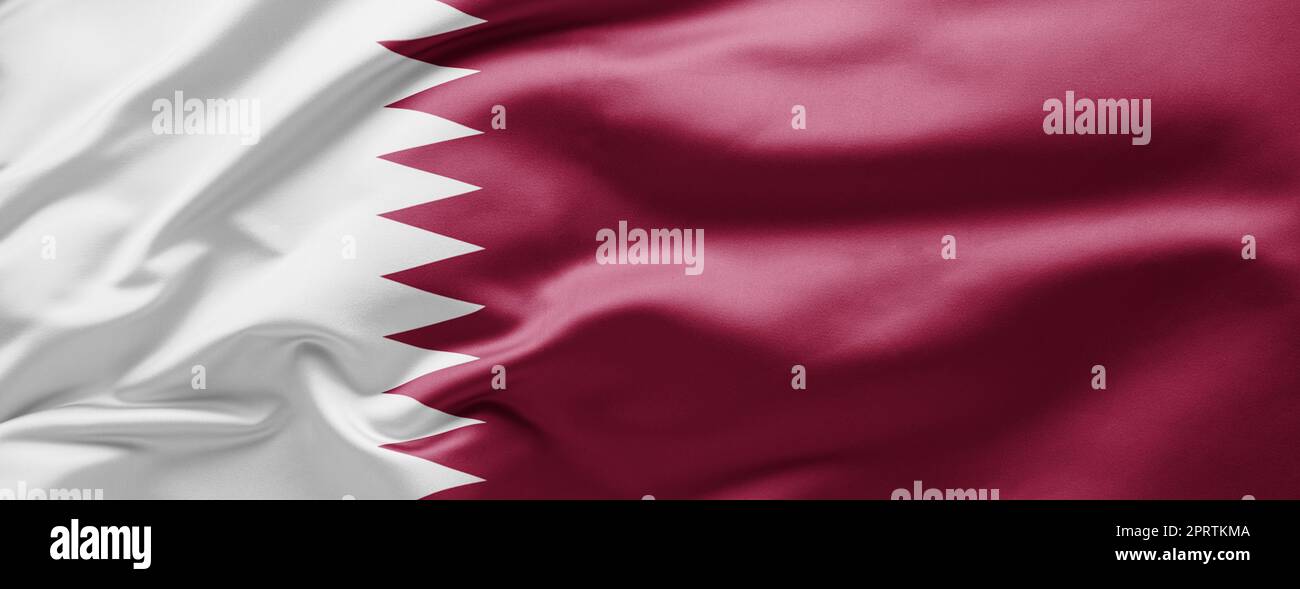 Sventolare la bandiera nazionale del Qatar Foto Stock