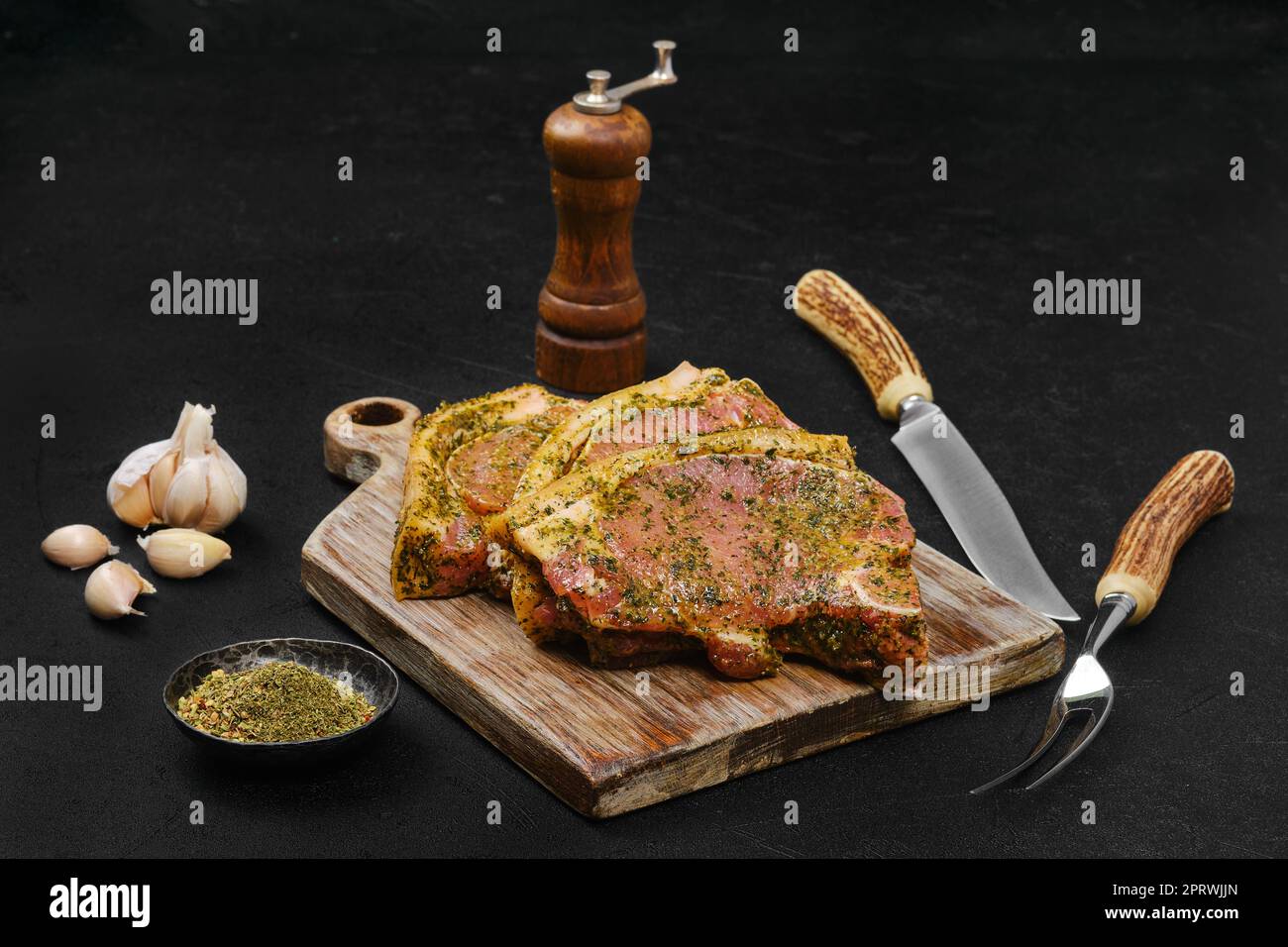 Bistecca di maiale marinata con spezie Foto Stock