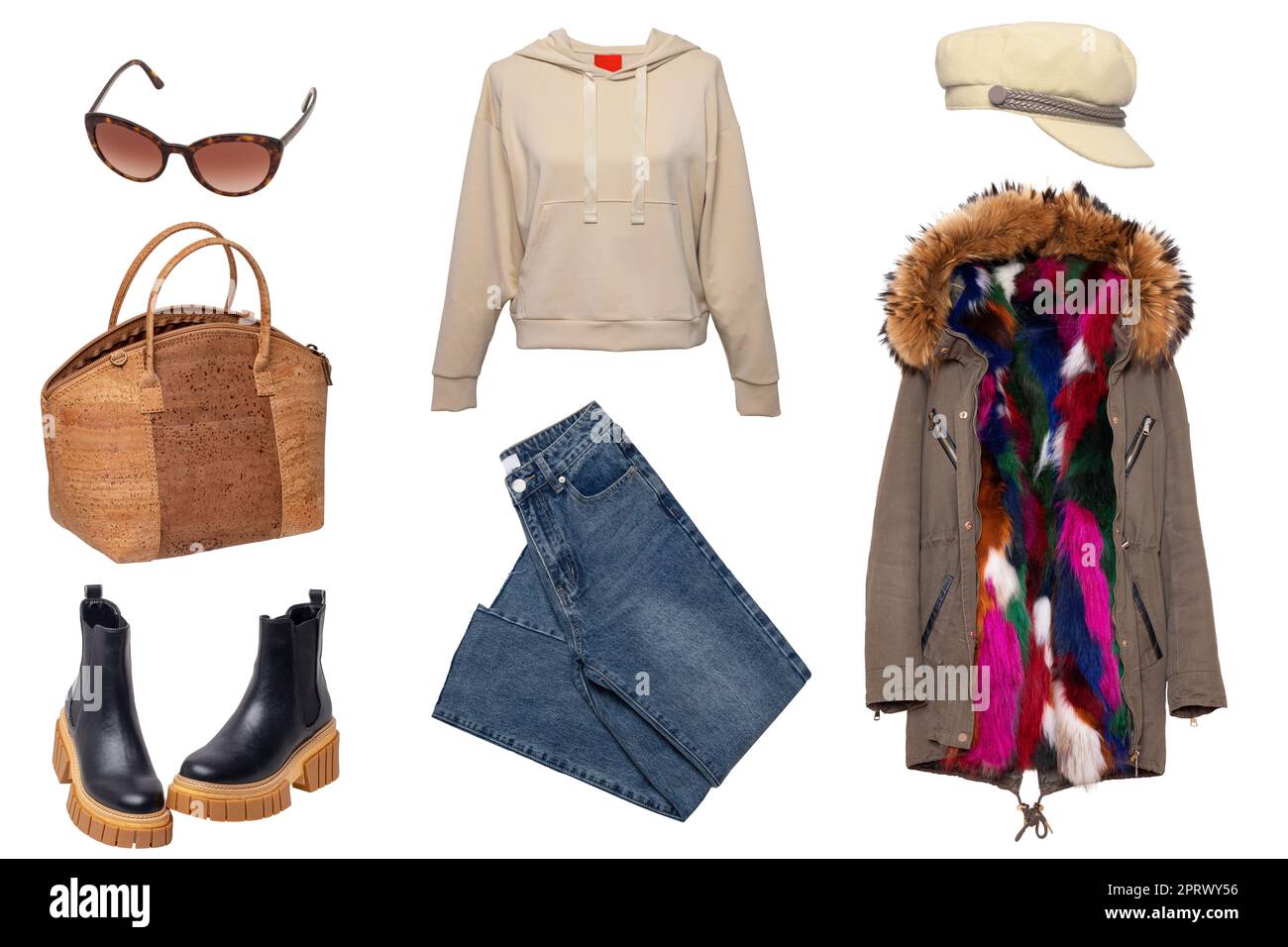 Vestiti da donna collage. Set di eleganti parka, jeans, felpa con cappuccio, stivali chelsea in pelle nera, una borsa e altri accessori isolati. Moda invernale. Foto Stock